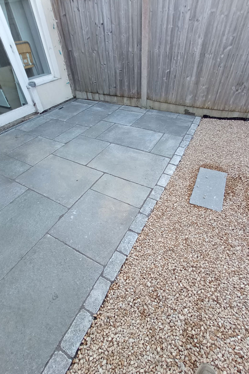 Grey sandstone paving slabs